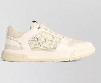 Amiri low leather blend sneakers perforated toe sole