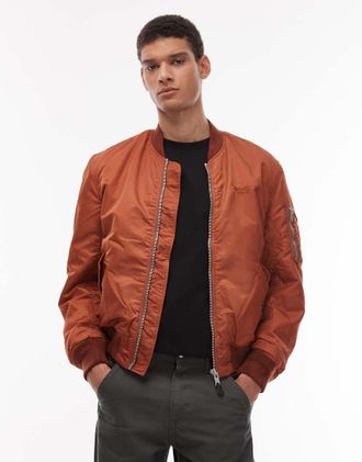 Schott NYC Giacca imbottita corta color rame con logo tono su tono e zip-Arancione