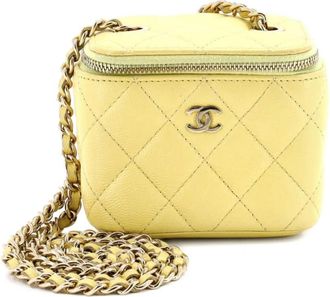 Chanel Trousse make up mini in pelle Caviar trapuntata con catena - Giallo