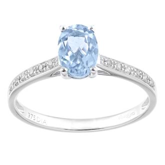 Diamant L'éternel 9 ct witgoud, 0,92 ct blauwe topaas en 0,05 ct diamanten schouderring