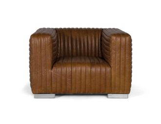 Giner&Colomer Sill&oacute;n tapizado en cuero forma c&uacute;bica y patas de acero