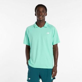 New Balance Hombre Tournament Polo en Verde/Blanco, Poly Knit, Talla XL