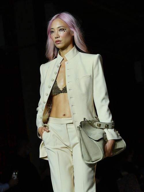 Model with face gems walks the Etro Spring/Summer 2022 fashion show