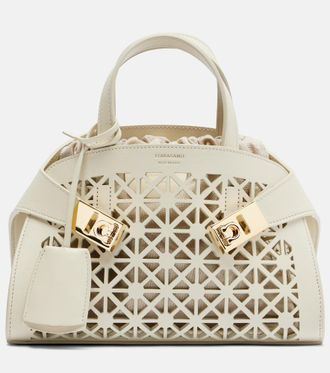 Ferragamo Hug Mini laser-cut leather top-handle bag