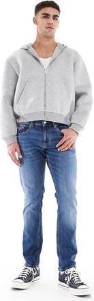 Tommy Jeans Scanton slim fit jeans in mid wash-Blue