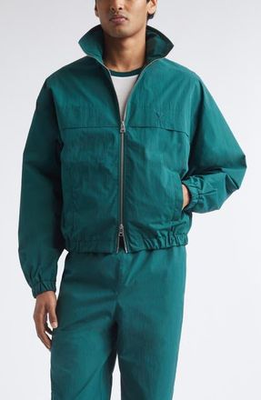 Ami Embossed Ami de Coeur Water Repellent Windbreaker Jacket in Vert Sapin at Nordstrom, Size X-Large