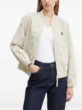 A|X Armani Exchange logo-plaque bomber jacket - women - Polyurethane/Polyamide/Polyester - L - Neutrals