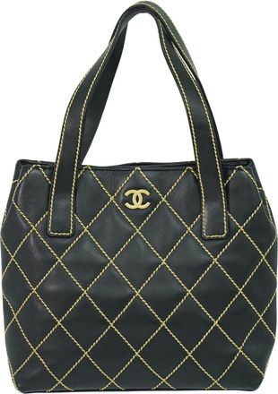 Chanel Surpique Tote Quilted Leather Black Leather Handbag (Pre-Owned)