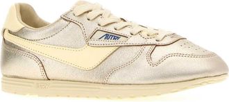 Autry Womens Gold Leather Windspin Sneakers Lamlealeaplatrut