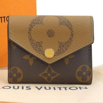 Louis Vuitton Brown Monogram Monogram Reverse Pvc Leather Wallet (Tri-Fold) (Pre-Owned)
