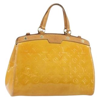 Louis Vuitton Pre-owned Handbags, female, Yellow, Size: ONE SIZE Pre-owned Blair MM Hand Bag