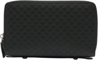 Gucci Pre-owned Wallets, male, Black, Size: ONE SIZE Pre-owned Microguccissima Leather Clutch Bag
