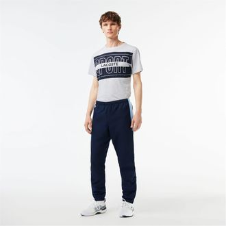Lacoste Mens Solid Patterned Slim Joggers in Navy Blue/White - Size X-Small