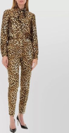 Moschino slim fit leopard print trousers with side pockets