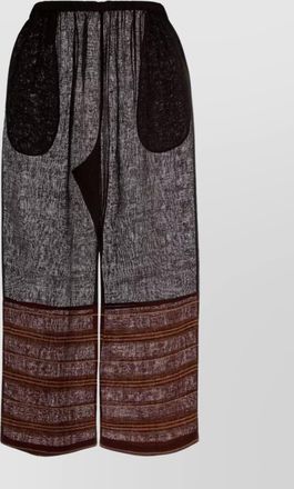 Tory Burch wide-leg linen trousers featuring contrast pockets