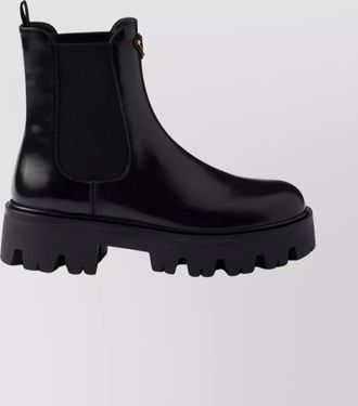 Prada ankle boots with chunky sole and pull tabs