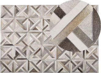 Beliani Rug TAYTAN Beige 140 x 200 cm Leather