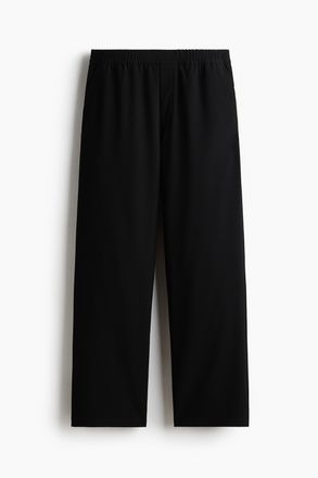 H&M Weite Schlupfhose mit Four-way-Stretch - Schwarz