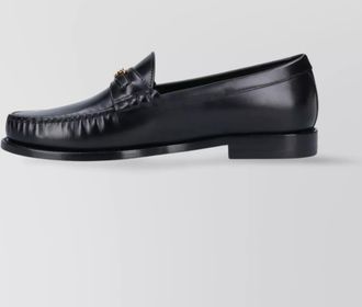 Celine loafers with gold-tone hardware and leather upper