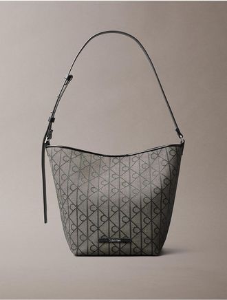 Calvin Klein Womens Allover Emblem Logo Jacquard Bucket Bag with Pouch - Black