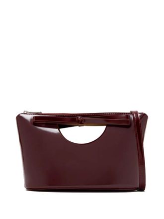 Studio Amelia bow-detail cut-out clutch bag - Red