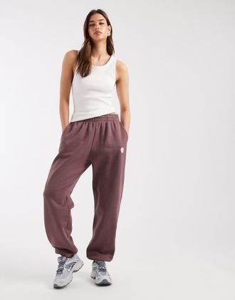Nike Phoenix Fleece - Joggers oversize a vita alta marroni-Marrone