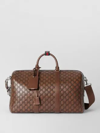 Gucci travel bag adjustable shoulder strap top handles