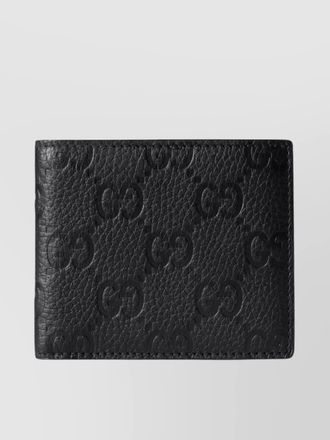 Gucci imprint textured leather bi-fold wallet