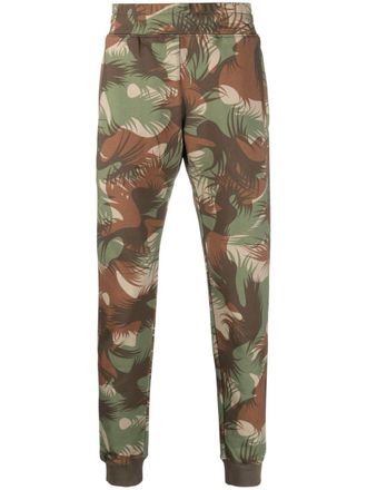 Moschino camouflage-print cotton track pants - men - Cotton - 44 - Green