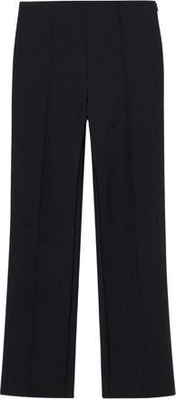 SIMKHAI Pantaloni con zip laterale - Nero