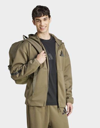 adidas Z.n.e. - Giacca sportiva color oliva strata con zip e cappuccio-Verde