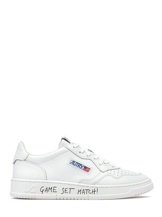 Autry Low-Top Leather Sneakers with Perforated Detailing and Unique Sole Accents