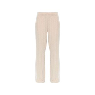 Lacoste Pantalones de ch&aacute;ndal acampanados con monograma - Trousers - Mujer - Beige - XS