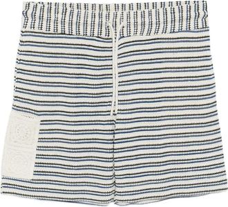 CHÉ Studios Matias gestreepte shorts - Beige