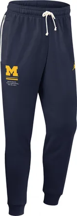 Nike Jordan Mens Michigan Sideline Standard Issue Jordan Brand Dri-FIT College Taper Pants in Blue | 0JB041SMWN-WL2