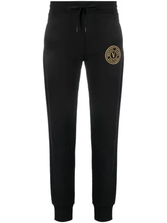 Versace Jeans Couture V-Emblem print track pants - women - Cotton/Cotton - M - Black