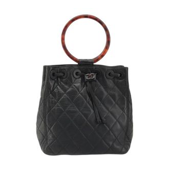Chanel Pre-owned Handbags, female, Black, Size: ONE SIZE Pre-owned Quilted Leather Drawstring Bucket Bag with Tortoiseshell Handle