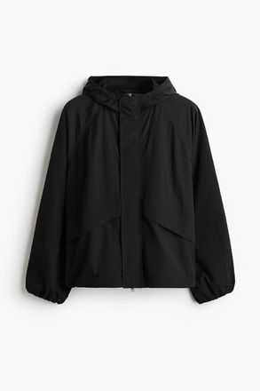 H&M Windjacke aus Nylon in Loose Fit - Schwarz