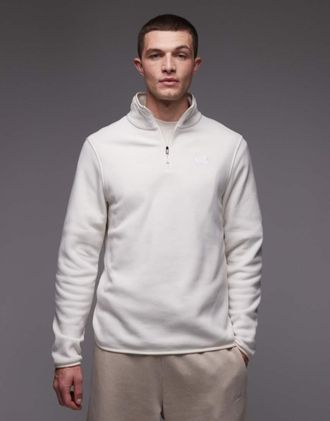 The North Face Glacier 100 - Pile bianco sporco con zip corta