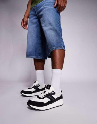 A|X Armani Exchange Sneakers in misto camoscio nere e bianco sporco con suola spessa e logo-Nero