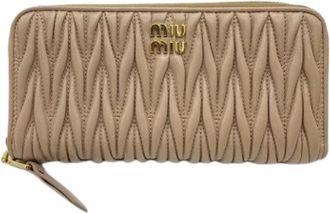Miu Miu Pre-owned Matelasse Long wallet (bi-fold) - Dames - Vintage Accessoires - Beige - ONE Size - Leer - Vintage
