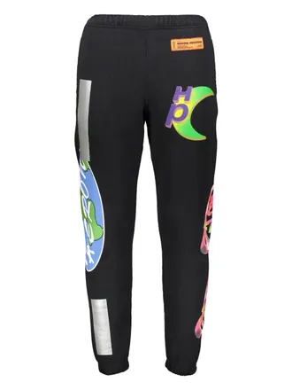 Heron Preston all-over printed trousers - men - Cotton - L - Black