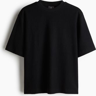 H&M Baumwoll-T-Shirt in Oversize Fit - Schwarz