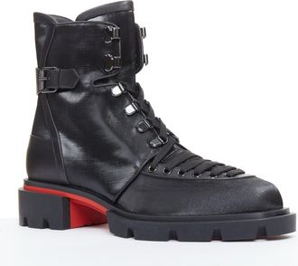 Christian Louboutin flat coated canvas boots