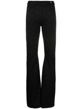 Versace Greca-knit flared trousers - women - Viscose/Elastane/Polyamide - 38 - Black