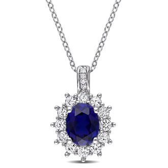 Amour Diamond and 4 CT TGW Created Blue and Created White Sapphire Oval Halo Pendant with Chain In Sterling Silver