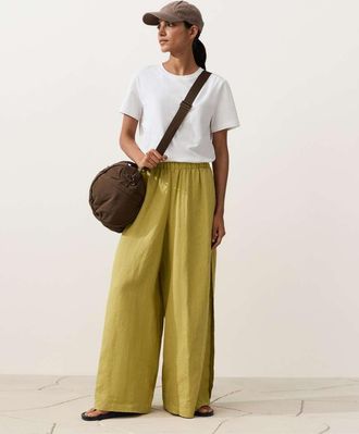 Oysho Pantaloni a fondo ampio in 100% lino verde lime con pieghe laterali