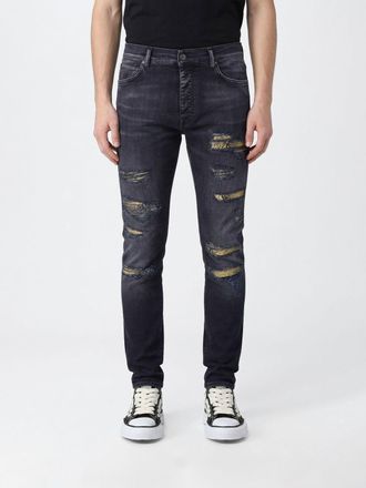 Amiri Slim Fit Jeans In Distressed Denim