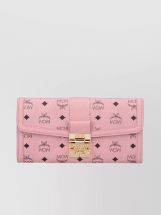 MCM gold-tone hardware wallets with timeless style