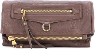 Louis Vuitton Petillante Monogram Empreinte Leather clutch bag - Bruin
